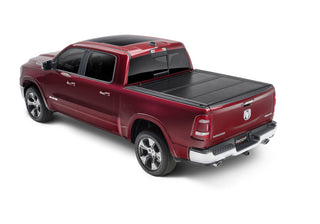 UnderCover Flex Folding Bed Cover 6.4ft: Fits Most Dodge Ram / Dakota Models (1994-2004) - Black Textured