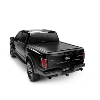 Retrax PowertraxPRO MX Matte Black Powder Coated Retractable Tonneau Cover: Fits Most Dodge / Ram 1500 Models (2002-2024)