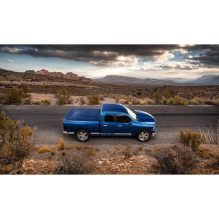 UnderCover Painted LUX Truck Bed Cover 5.7ft (NO RAMBOX): Fits Most Ram 1500 Models (2019-2026) - Velvet Red Pearl