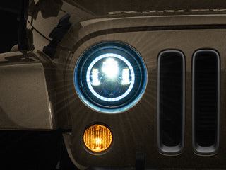 Raxiom Axial 7-Inch LED Headlights RGB Halo Black Hsng: Jeep Wrangler 1997-2018 4.0L I6 / 3.8L V6 / 3.6L V6 - Clear Lens
