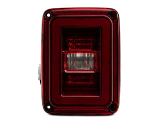 Raxiom JL Style LED Tail Lights - Black Housing / Red Lens: Fits Most Jeep Wrangler Models (2007-2018)