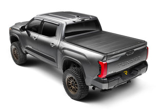 Retrax EQ Electric Retractable Bed Cover: Ram 1500 2019-2024 3.6L/5.7L/6.2L TRX w/ RAM Boxes