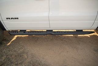 DV8 Offroad OE Plus Side Steps Black Steel (SIDE): Ram 1500 Crew Cab 2019-2025 5.7L/6.2L