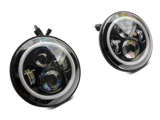 Raxiom Axial 7-Inch LED Headlights RGB Halo Black Hsng: Jeep Wrangler 1997-2018 4.0L I6 / 3.8L V6 / 3.6L V6 - Clear Lens