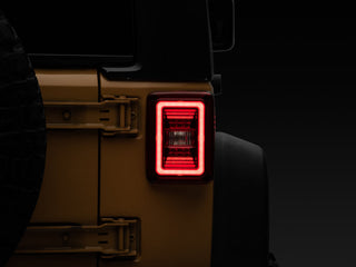 Raxiom JL Style LED Tail Lights - Black Housing / Red Lens: Fits Most Jeep Wrangler Models (2007-2018)