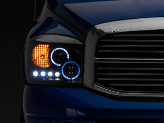 Raxiom LED Halo Projector Headlights Black Housing (Clear Lens): Fits Most Dodge Ram Models (2002-2010)