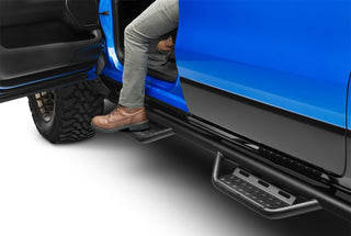 N-Fab RS Nerf Step Hoop Design Cab Length (LH): Fits Ram 1500 2019-2026 6.2L/5.7L - Tex. Black