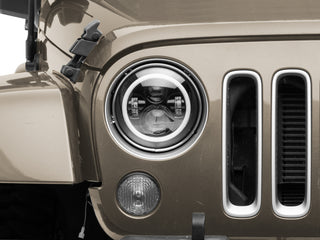Raxiom Axial 7-Inch LED Headlights RGB Halo Black Hsng: Jeep Wrangler 1997-2018 4.0L I6 / 3.8L V6 / 3.6L V6 - Clear Lens