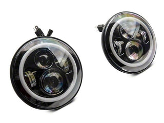 Raxiom Axial 7-Inch LED Headlights RGB Halo Black Hsng: Jeep Wrangler 1997-2018 4.0L I6 / 3.8L V6 / 3.6L V6 - Clear Lens
