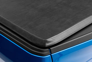 LUND Genesis Tri-Fold Tonneau Cover Black: Fits Dodge Ram 1500/2500/3500 2002-2023