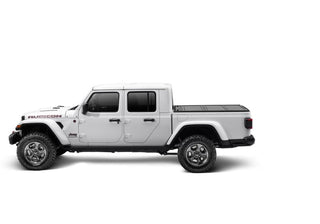 UnderCover Ultra Flex Folding Truck Bed Cover (5ft) Matte Black Finish: Fits Most Jeep Gladiator Models (2018-2026)