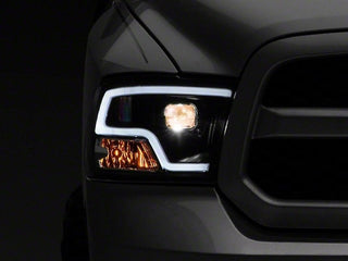 Raxiom LED Halo Projector Headlights Black Housing (Clear Lens): Fits Most Dodge / Ram 1500 Models (2002-2018)