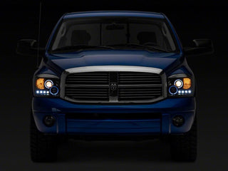 Raxiom LED Halo Projector Headlights Black Housing (Clear Lens): Fits Most Dodge Ram Models (2002-2010)