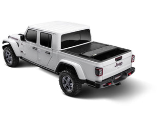 UnderCover Ultra Flex Folding Truck Bed Cover (5ft) Matte Black Finish: Fits Most Jeep Gladiator Models (2018-2026)