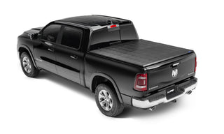 LUND Genesis Tri-Fold Tonneau Cover Black: Fits Dodge Ram 1500/2500/3500 2002-2023