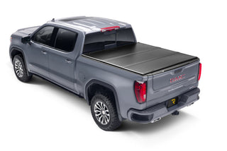 UnderCover Triad Hard Folding Truck Bed Cover 5ft: Fits Most Jeep Gladiator Models (2018-2026) - Matte Black