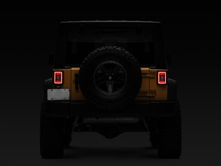 Raxiom JL Style LED Tail Lights - Black Housing / Red Lens: Fits Most Jeep Wrangler Models (2007-2018)