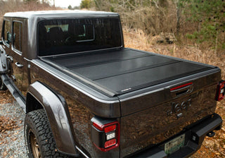 UnderCover Armor Flex Hard Folding Bed Cover 5ft: Fits Most Jeep Gladiator Models (2018-2026) - Matte Black