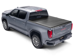 UnderCover Triad Hard Folding Truck Bed Cover 5ft: Fits Most Jeep Gladiator Models (2018-2026) - Matte Black