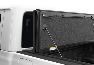 UnderCover Ultra Flex Folding Truck Bed Cover (5ft) Matte Black Finish: Fits Most Jeep Gladiator Models (2018-2026)