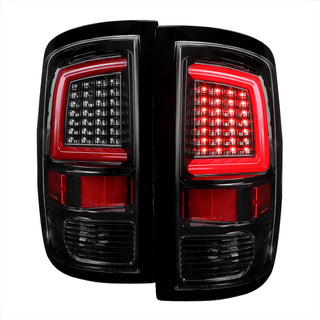 Spec D LED Tail Lights (Glossy Black w/ White LED Bar): Dodge Ram 2009 - 2018