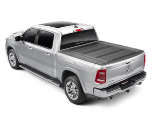 UnderCover Armor Flex Hard Folding Bed Cover 5.7ft w/ Rambox: Fits Most Ram 1500 Models (2019-2026)