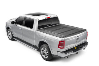 UnderCover Armor Flex Hard Folding Bed Cover 5.7ft w/ Rambox: Fits Most Ram 1500 Models (2019-2026)