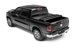 LUND Genesis Tri-Fold Tonneau Cover Black: Fits Ram 1500 2009-2022 3.6L/5.7L Hemi