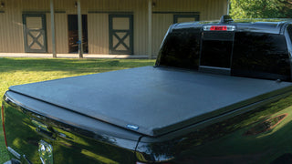 LUND Genesis Tri-Fold Tonneau Cover Black: Fits Ram 1500 2009-2022 3.6L/5.7L Hemi