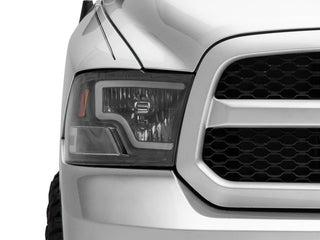 Raxiom LED Bar Headlights Black Housing (Clear Lens): Fits Most Dodge / Ram 1500 / 2500 / 3500 Models (2002-2018)