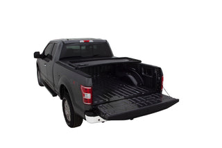 LUND Genesis Tri-Fold Tonneau Cover Black: Fits Ram 1500 2009-2022 3.6L/5.7L Hemi