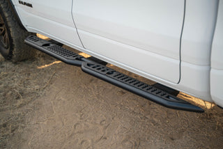 DV8 Offroad OE Plus Side Steps Black Steel (SIDE): Ram 1500 Crew Cab 2019-2025 5.7L/6.2L