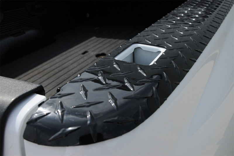 Deezee 09-19 Dodge/Ram Ram Bed Cap Wrap W/Stake Pockets Black-Tread Aluminum 8Ft Bed