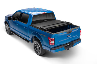 LUND Hard Fold Tonneau Cover Black: Fits Dodge Ram 1500/2500/3500 2002-2024