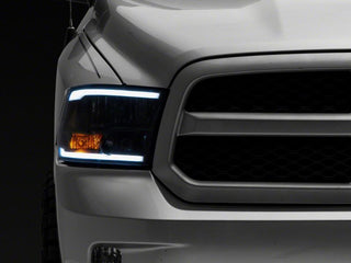 Raxiom Axial Series Black Housing Headlights w/ LED Bar: Fits Most Dodge / Ram 1500 / 2500 / 3500 Models (2002-2018)