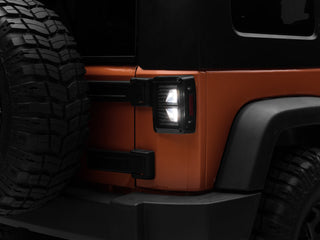 Raxiom Axial Series Vision LED Tail Lights - Black Housing with Smoked Lens: Fits Most Jeep Wrangler Models (2007-2018)