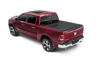 UnderCover Armor Flex Hard Folding Bed Cover 5.7ft (NEW BODY STYLE): Ram 1500 (2019-2026) - Black Textured