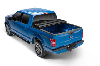LUND Hard Fold Tonneau Cover Black: Fits Dodge Ram 1500/2500/3500 2002-2024