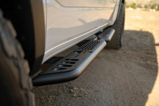 DV8 Offroad OE Plus Side Steps Black Steel (SIDE): Ram 1500 Crew Cab 2019-2025 5.7L/6.2L
