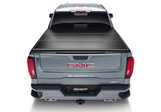 UnderCover Triad Hard-Folding Truck Bed Cover 6.4ft: Fits Most Ram 1500 Models (2019-2026) - Matte Black
